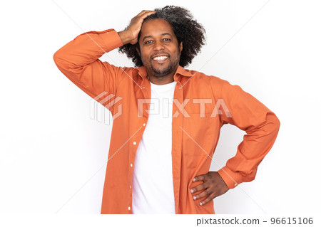 Portrait of happy mid adult man posing with hand on hip 96615106