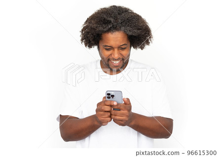 Joyful African American man using phone Joyful African American man using phone 96615300