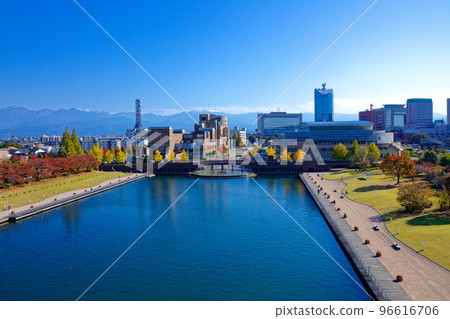 Fugan Canal Kansui Park with a view of the Tateyama mountain range from Tenmonbashi 96616706