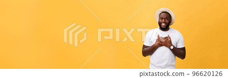 Headshot of surprised young dark-skinned man student wearing casual grey t-shirt staring at camera with shocked look, expressing astonishment and shock. Headshot of surprised young dark-skinned man student wearing casual grey t-shirt staring at camera with shocked look, expressing astonishment and shock. 96620126