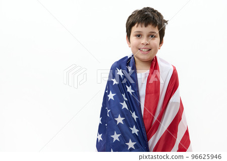 Isolated portrait on white background of a happy American teenage boy with USA flag. Citizenship, immigration, emigration, winning the green card lottery and freedom concept. Independence Day July 4 Isolated portrait on white background of a happy American teenage boy with USA flag. Citizenship, immigration, emigration, winning the green card lottery and freedom concept. Independence Day July 4 96625946