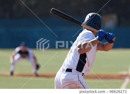 Baseball players in action on the stadium, baseball batter waiting to strike the ball 96626271
