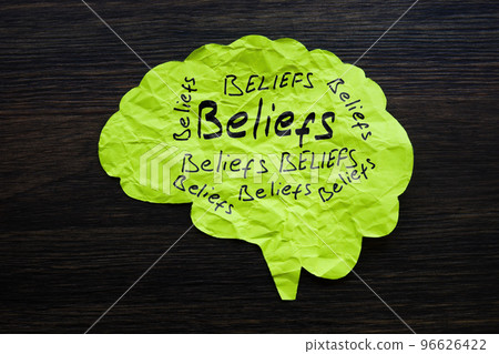 Paper brain with handwritten words beliefs. Bias concept. Paper brain with handwritten words beliefs. Bias concept. 96626422