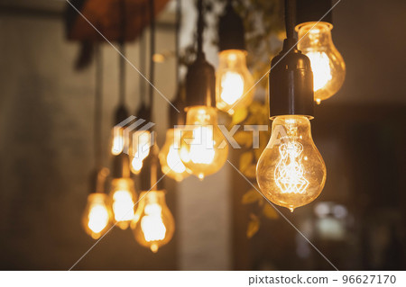 Chandelier with edison lamps in a dark room Chandelier with edison lamps in a dark room 96627170