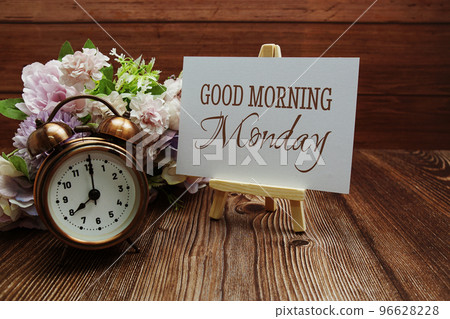 Good Morning Monday text on paper card on wooden background 96628228