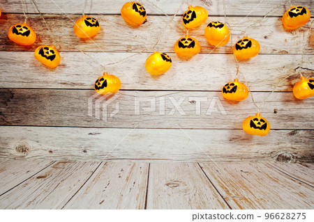 Pumpkin Lights LED for Halloween Decorations on wooden background Pumpkin Lights LED for Halloween Decorations on wooden background 96628275