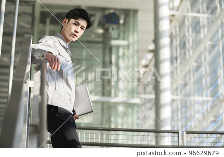 Young engineer man with a laptop 96629679