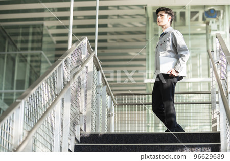 Young engineer man with a laptop 96629689