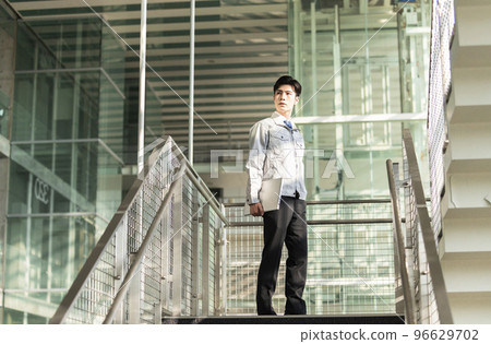 Young engineer man with a laptop 96629702