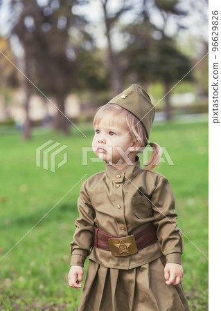 Adorable baby girl in Soviet military uniform Adorable baby girl in Soviet military uniform 96629826