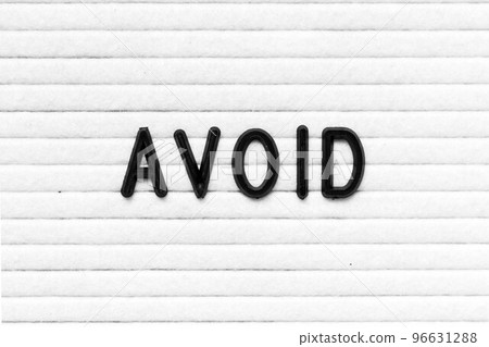 Black color letter in word avoid on white felt board background 96631288