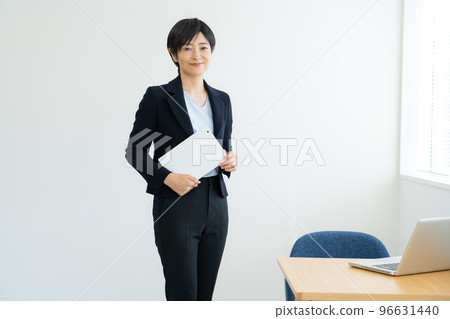 Business woman desk work 96631440