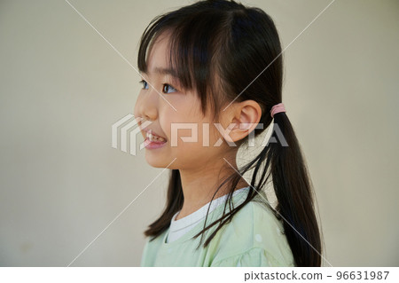 Smiley elementary school girl 96631987