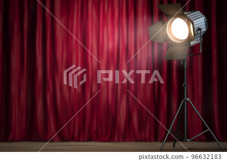 Stage or studio spotlight on red curtain background. Lighting equipment for Studio photography or videography. 96632183
