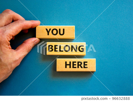 You belong here symbol. Concept words You belong here on beautiful blue table blue background. Businessman hand. Diversity, business, inclusion and belonging concept. You belong here quote. You belong here symbol. Concept words You belong here on beautiful blue table blue background. Businessman hand. Diversity, business, inclusion and belonging concept. You belong here quote. 96632888