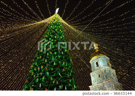 Christmas tree glows on the square in the city. Evening, night illumination 96633144
