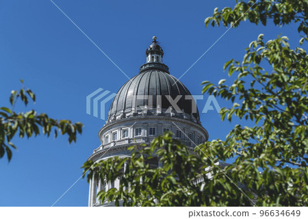 The architecture of buildings windows, stucco molding, and columns on a sunny day in the USA The architecture of buildings windows, stucco molding, and columns on a sunny day in the USA 96634649