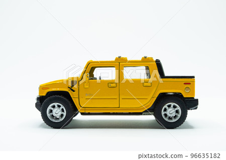 Yellow off road car toy on white background Yellow off road car toy on white background 96635182