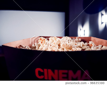 Cinema and entertainment, popcorn box in the movie theatre for tv show streaming service and film industry production branding Cinema and entertainment, popcorn box in the movie theatre for tv show streaming service and film industry production branding 96635380