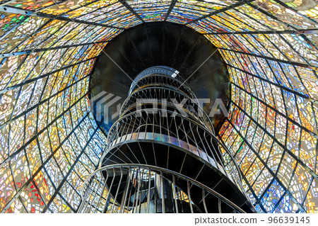Stained glass wall and spiral staircase 96639145