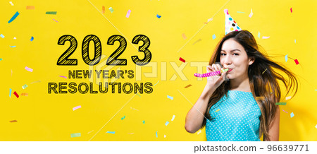 2023 New Years Resolutions with young woman with party theme 96639771