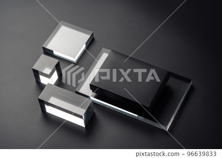 Elegant composition with black box mockup and glass geometric shapes. Black cardboard box for your design. 96639833