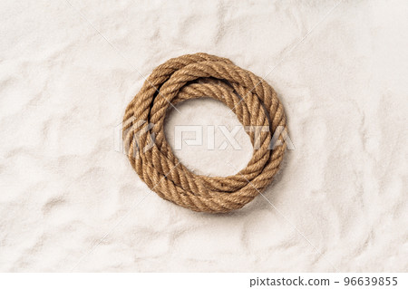 Mockup round scene on a sand. Nautical template for product presentation or package advertisement made with rope on a sand. Circle stage for advertising. Top view. Copy space. 96639855