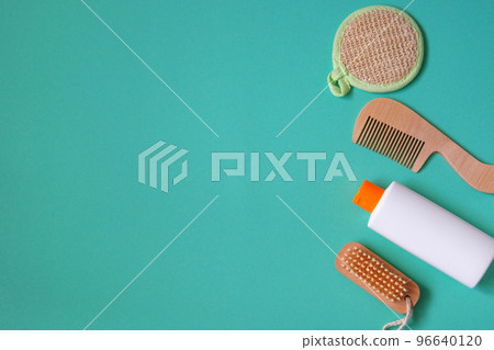 Cosmetic products on blue yellow background. Natural beauty products for branding mock-up concept. Top view, copy space. 96640120
