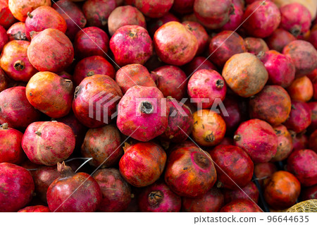Fresh ripe pomegranates in box for sale 96644635