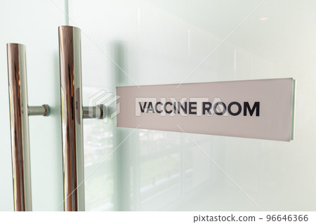 Concept of the word Vaccine Room at the door entrance of hospital 96646366