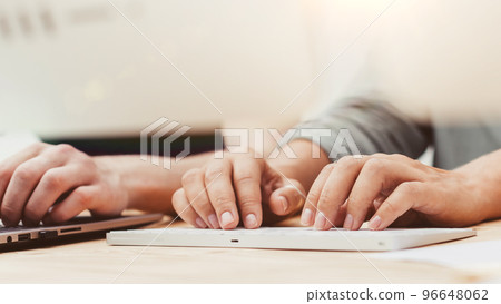 close up. businesswoman takes the text on a computer keyboard. close up. businesswoman takes the text on a computer keyboard. 96648062