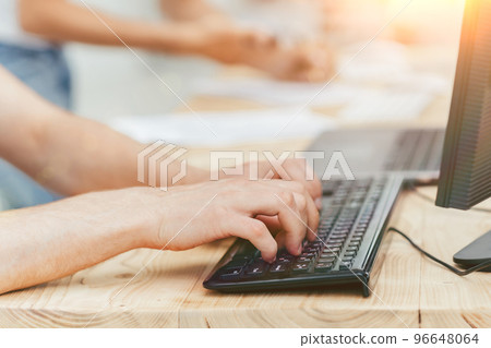 close up. businessman working on a personal computer close up. businessman working on a personal computer 96648064