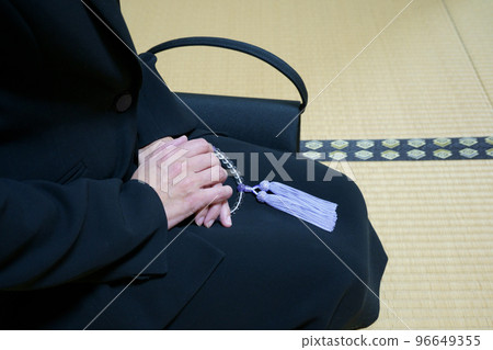 A woman sitting in a formal dress Faceless A woman sitting in a formal dress Faceless 96649355