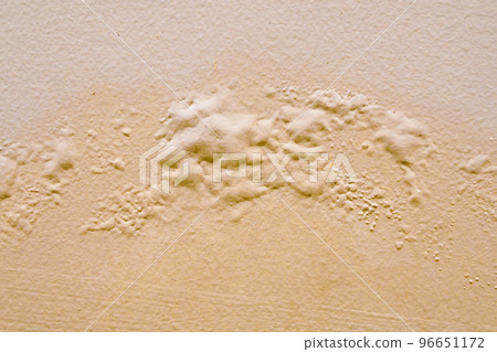 Brown wall damp damaged with peeling paint 96651172