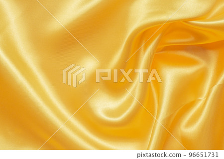 Abstract luxury gold fabric with soft wave texture background Abstract luxury gold fabric with soft wave texture background 96651731