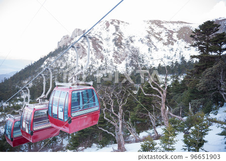 Travel in China, Tourists take cable cars to visit the Shika Snow Mountain in Shangri-la, southwest China's Yunnan Province, China. Travel in China, Tourists take cable cars to visit the Shika Snow Mountain in Shangri-la, southwest China's Yunnan Province, China. 96651903