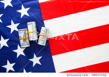 Business and finance concept. USA national flag and currency usd money banknotes. 96652348