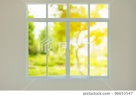 Modern house window with green garden view bokeh background 96653547