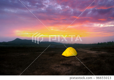 Camping with Yellow tent under the beautiful sky in the morning before the sunrise, Lampang, Thailand. 96655013