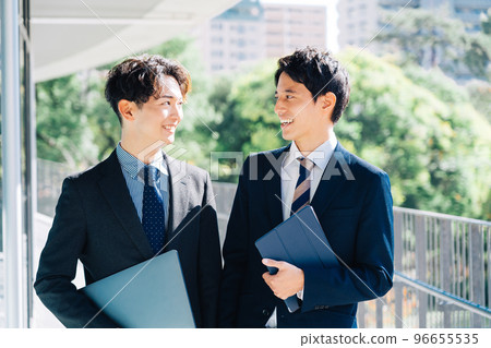 Two businessmen 96655535