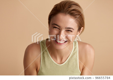 Beauty Woman Posing Isolated Portrait. Blonde Woman Model With Smooth Skin Beauty Woman Posing Isolated Portrait. Blonde Woman Model With Smooth Skin 96655784