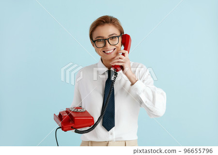 Businesswoman Talking Landline Telephone. Caucasian Woman Speaking on Smartphone 96655796