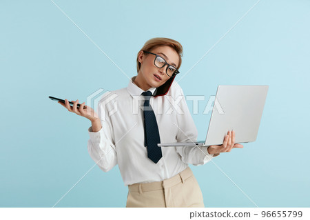 Busy Businesswoman Answering Calls Isolated. Caucasian Woman With Many Phones 96655799