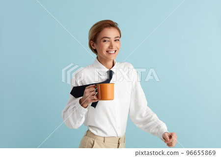 Smiling Businesswoman Holding Coffee. Portrait of Friendly Woman Drinking Coffee 96655869