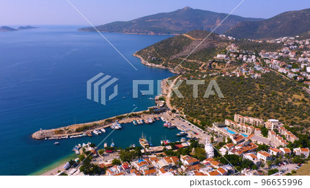 Aerial panoramic view of resort town on mountain coast. Sea bay surrounded by mountains with beautiful townscape. Aerial panoramic view of resort town on mountain coast. Sea bay surrounded by mountains with beautiful townscape. 96655996