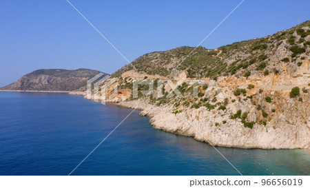 Spectacular view of rocky mountain and turquoise sea or ocean. Majestic nature landscape from drone. 96656019