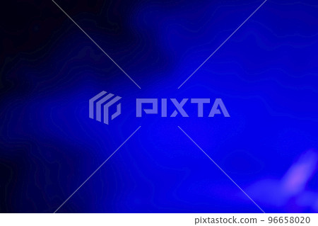 Blurred dark background with blue smoke light. Blurred dark background with blue smoke light. 96658020
