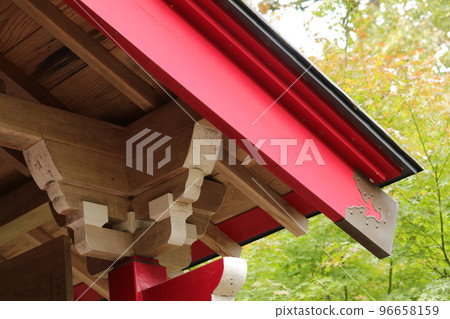 The red shrine of Benzaiten nestled in the mountains 96658159