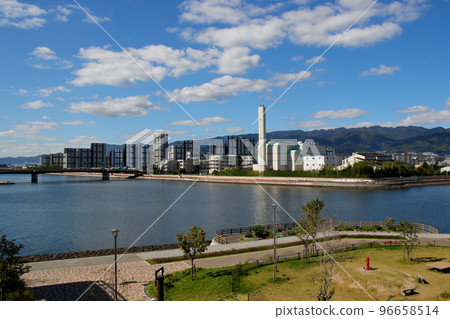 Nishinomiya City View of Ashiya City Environmental Processing Center's waste incineration facility and Astem Ashiya from Nishinomiyahama Comprehensive Park 96658514