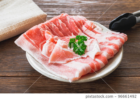 Sliced pork belly on a plate Sliced pork belly on a plate 96661492
